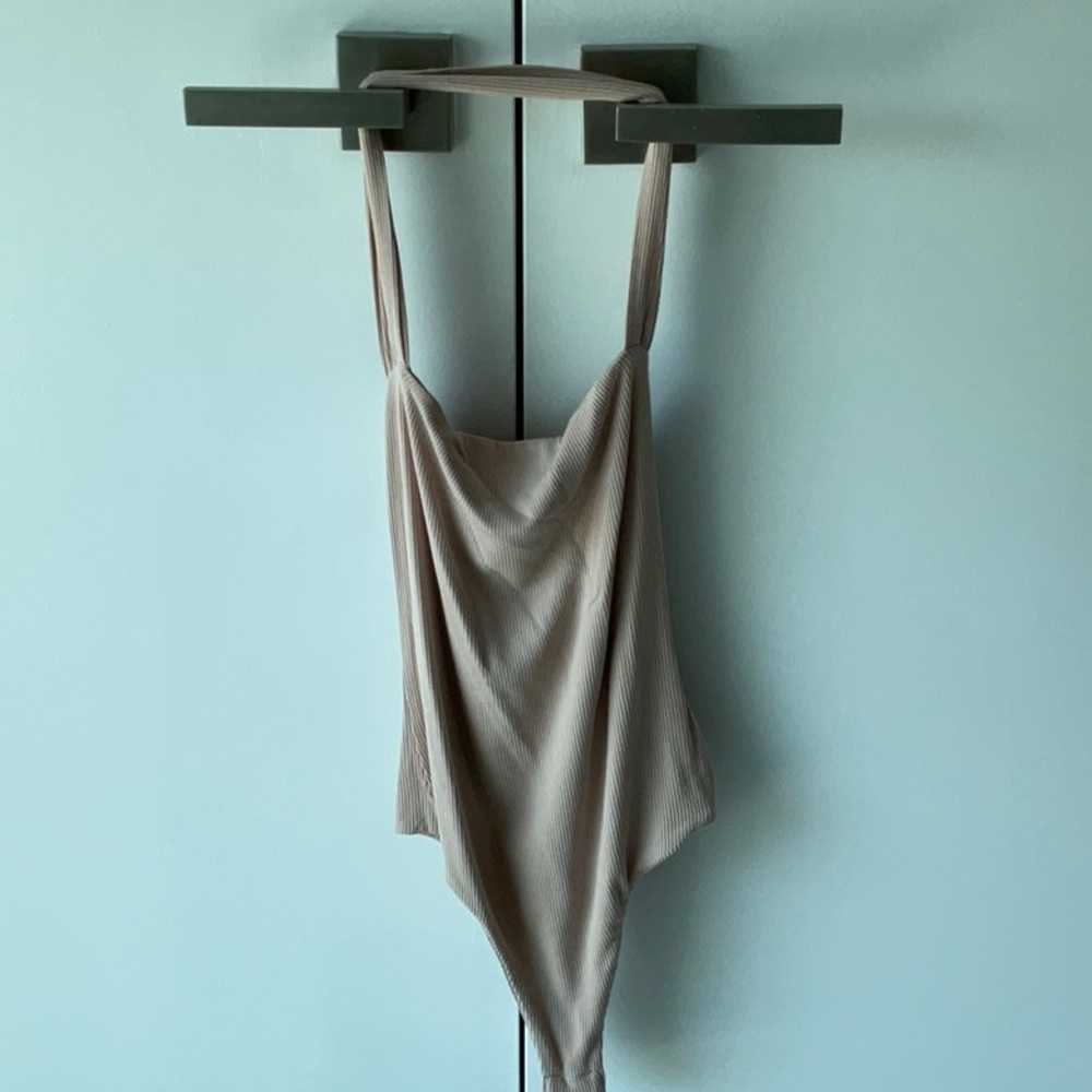 Body suit wraps around neck